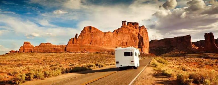 White RV driving into Grand Canyon National Park in Arizona