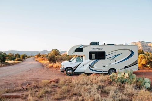 Image of an RV in the desert to convey RVing As a Solo Woman - Book Outdoors
