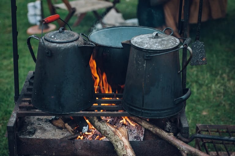 Image of camp cooking to convey the best vegan RV recipes - BookOutdoors
